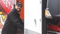 Trucker pumping gas